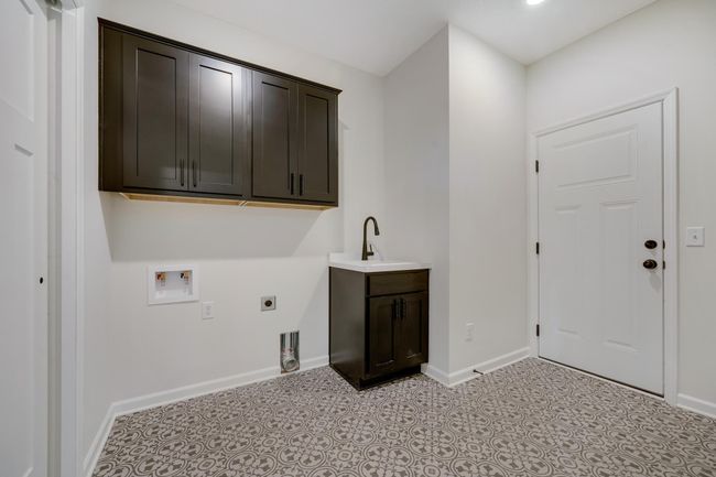 Laundry/mud room with cabinets and sink | Image 25