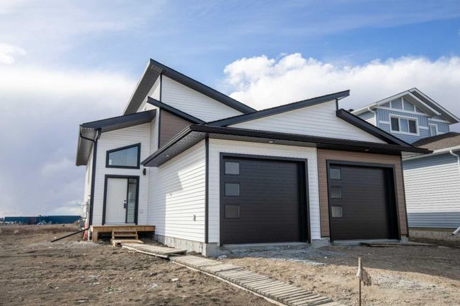 10341 128 Avenue, Home with 5 bedrooms, 3 bathrooms and 4 parking in Grande Prairie AB | Image 1
