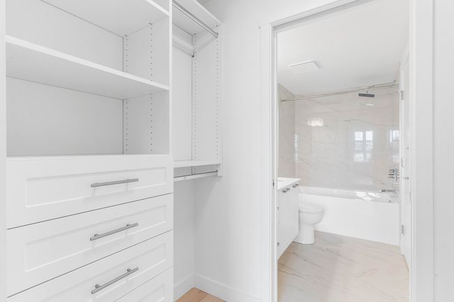 View of walk in closet | Image 15