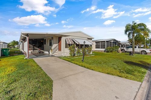 637 Periwinkle Cir, Barefoot Bay, FL, 32976-7676 | Card Image