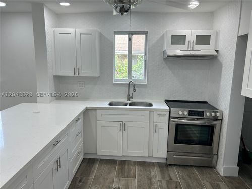 a-261 Nw 49th St, Miami, FL, 33127-2142 | Card Image
