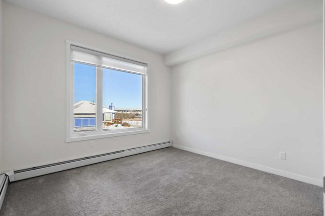 12 - 30 Shawnee Common Sw, Condo with 2 bedrooms, 3 bathrooms and 1 parking in Calgary AB | Image 22