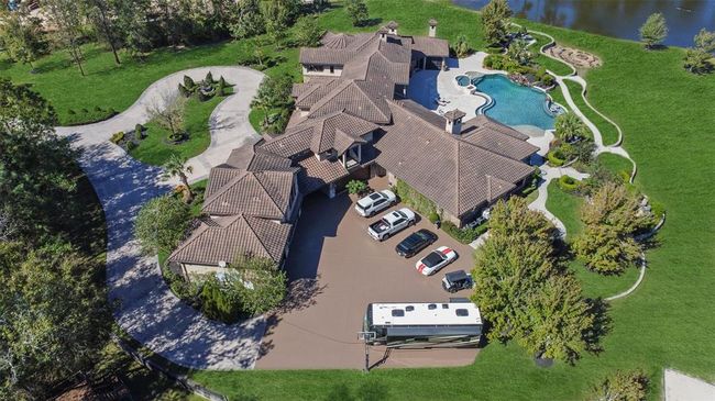 Plenty of parking in your choice of 3 garages or large parking slab with electric | Image 6