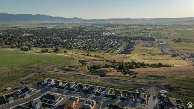 Aerial view of property's location featuring a mountainous background and rural landscape | Image 44