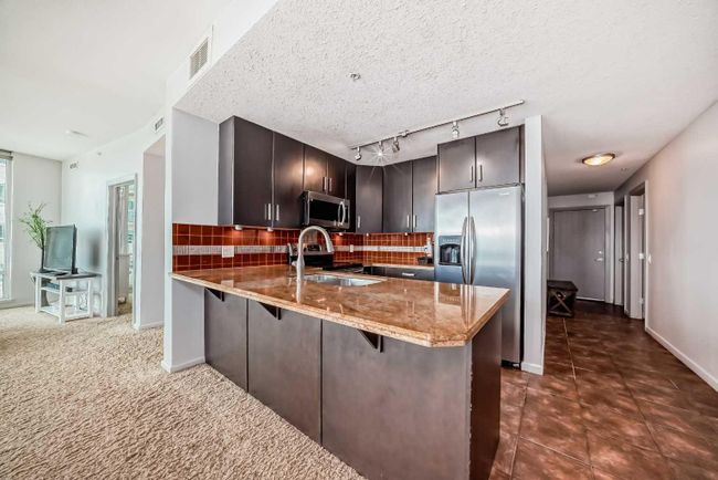 1306 - 1410 1 Street Se, Home with 2 bedrooms, 2 bathrooms and 1 parking in Calgary AB | Image 16