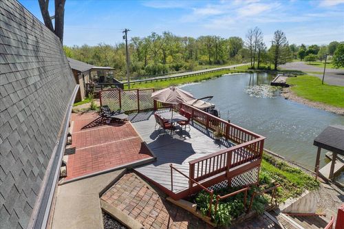 8095 Blue Heron Cv, Huntsville, OH, 43324-9689 | Card Image