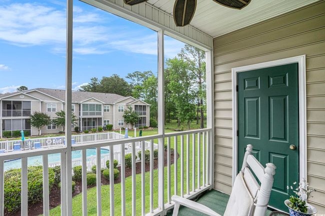Unfurnished sunroom with a residential view | Image 15