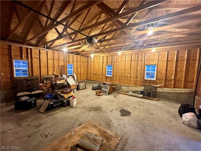 Garage with a garage door opener | Image 17