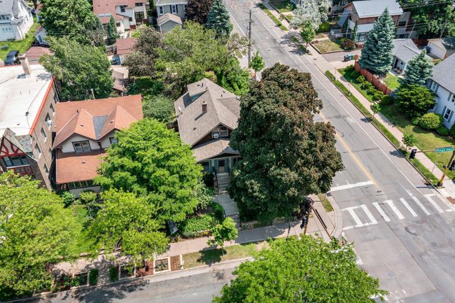 Perfectly situated on a sunny corner lot just steps from the vibrant heart of one of the city's most desirable neighborhoods. | Image 25