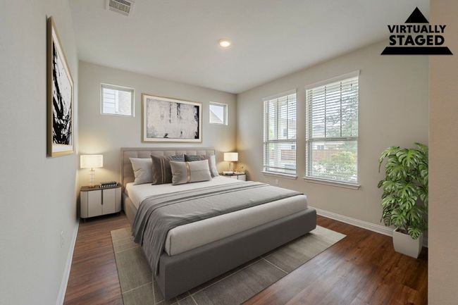 Bedroom featuring baseboards, wood finished floors, and recessed lighting | Image 20