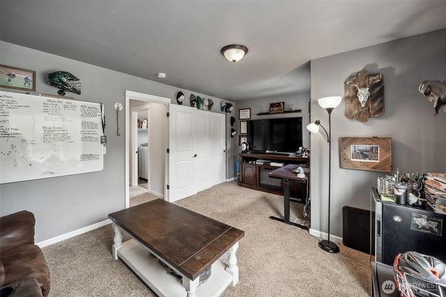 Call it a LARGE bonus room, bedroom #5, play area, home theatre....either way its a great flex space. | Image 24