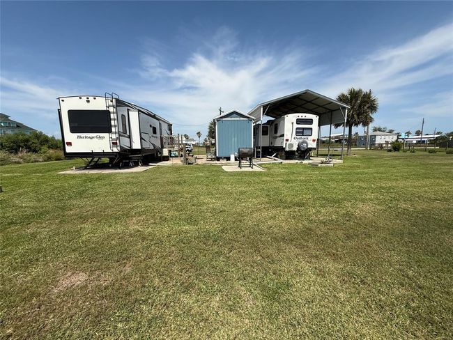 Two RV ports and a storage unit for laundry, washer/dryer convey with purchase. | Image 5