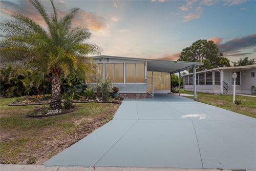 1002 Ginger Ln, Barefoot Bay, FL, 32976-7218 | Card Image