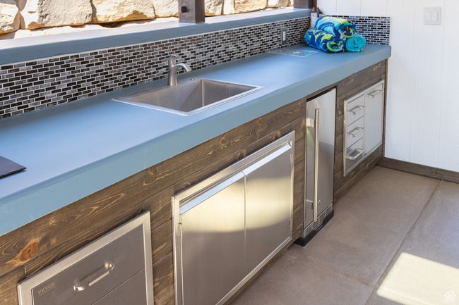 View of patio / terrace with a sink | Image 15