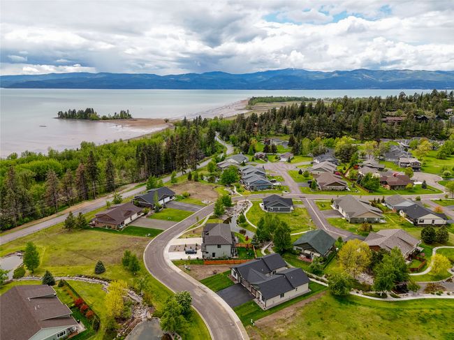 Aerial perspective of suburban area featuring a water and mountain view | Image 31