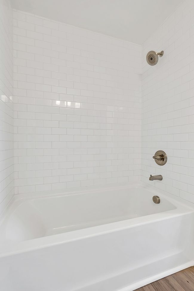 Beautifully-tiled shower-tub combo | Image 20