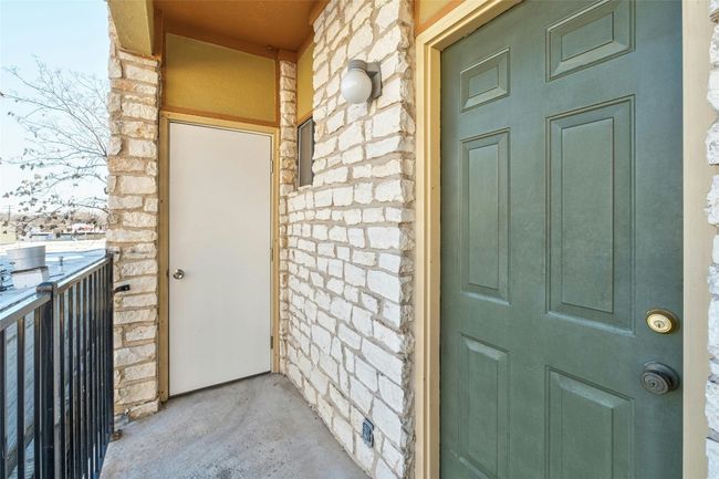 Entrance to property with stone siding | Image 22