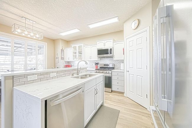 149 Bow Ridge Cres, House detached with 3 bedrooms, 3 bathrooms and 4 parking in Cochrane AB | Image 14