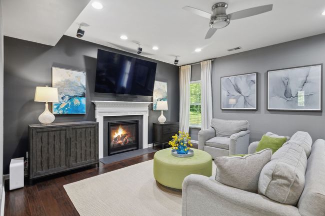 The cozy living room looks onto the knock your socks off backyard. We'll see that momentarily | Image 5