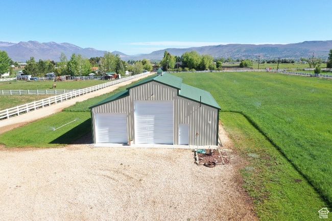 Detached garage with a rural view and a mountain view | Image 36