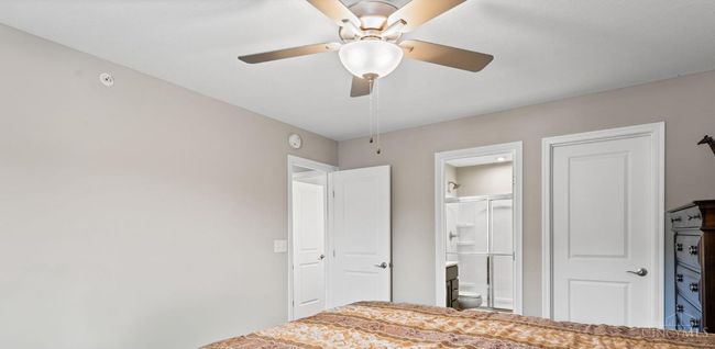 Large walk in closet, adjoining bath in primary suite | Image 22