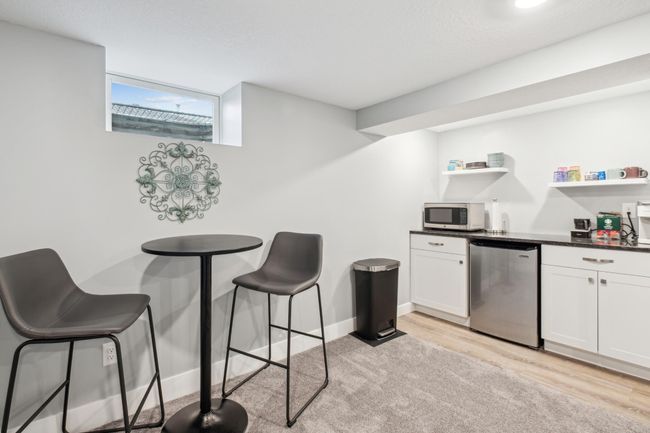 Walk-up bar in the basement family room | Image 13