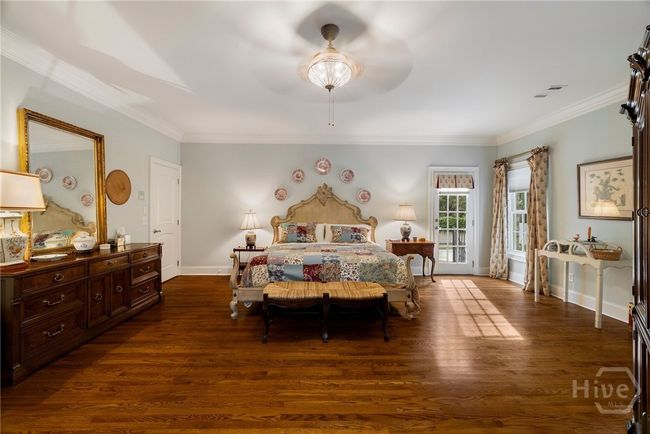 Primary bedroom with door to back deck | Image 26