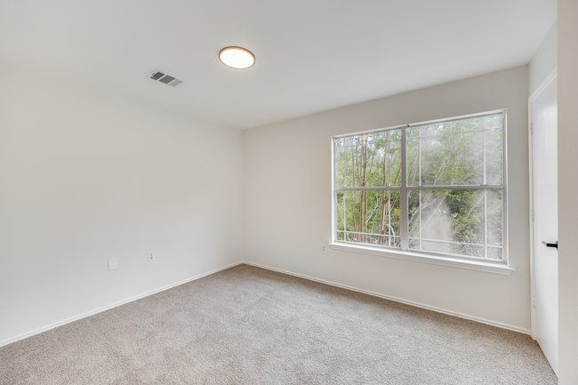 Spare room with carpet and baseboards | Image 24