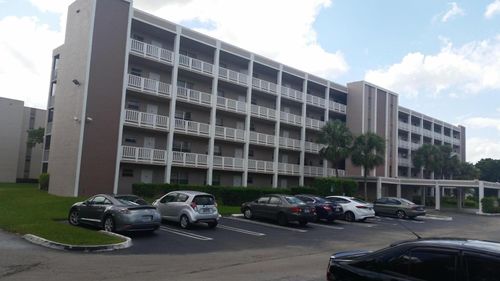 105-8720 Shadow Wood Blvd, Coral Springs, FL, 33071-6700 | Card Image
