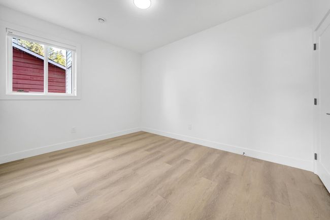 Spare room with light wood-type flooring and baseboards | Image 23