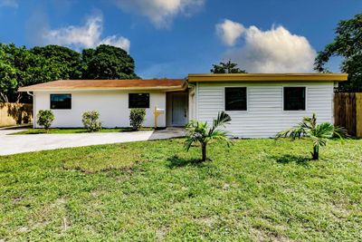 312 Baker Drive, House other with 4 bedrooms, 3 bathrooms and null parking in West Palm Beach FL | Image 1