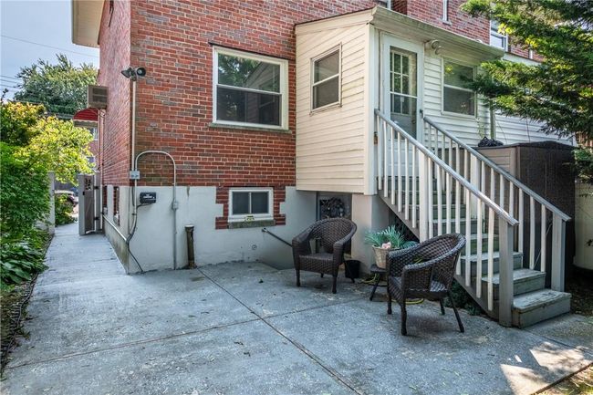 Rear view of property featuring a patio | Image 22