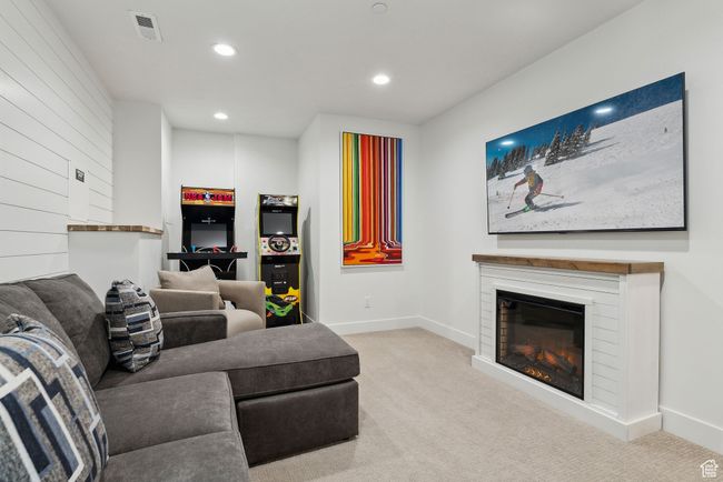 View of carpeted living room | Image 38