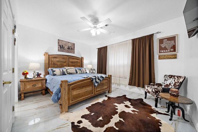 Cozy bedroom with a warm and inviting atmosphere | Image 24