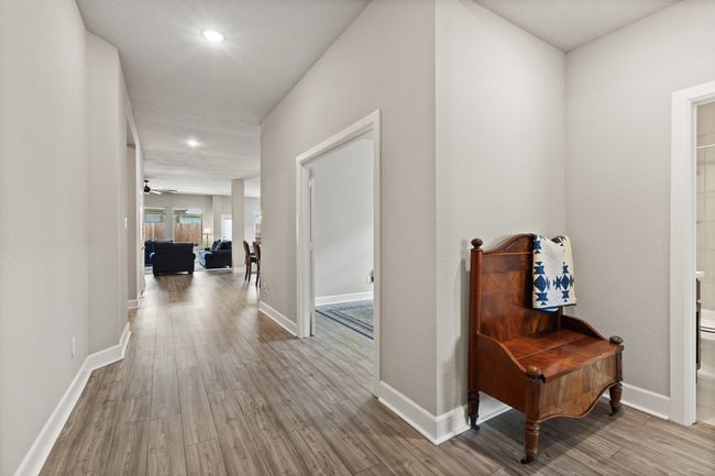 Another view coming in the front door - there is a guest bedroom immediately to the right with a private full bathroom; the double door area is the entrance to the dedicated office. | Image 6