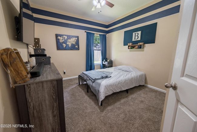 11760 Huckleberry Trl E, House other with 4 bedrooms, 2 bathrooms and null parking in MACCLENNY FL | Image 29