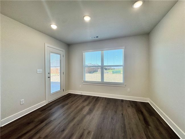 Eat-in area in the perfect location and a great view of the backyard. | Image 9