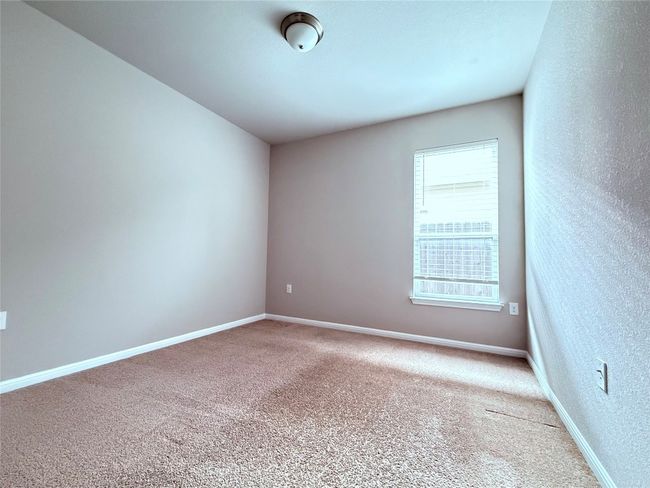 Spare room with carpet floors and baseboards | Image 11
