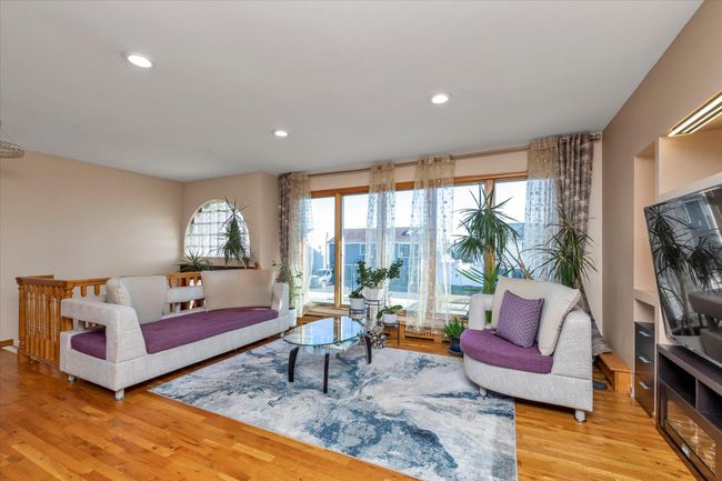 Living room with recessed lighting and wood finished floors | Image 6