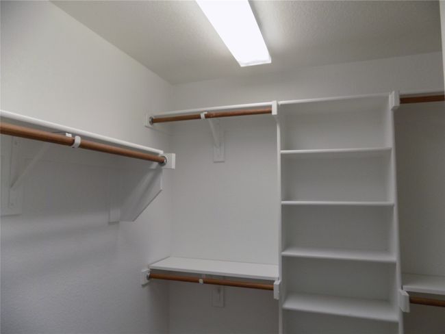 View of spacious closet | Image 23