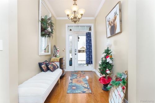 4695 Emerald Valley Loop, Fowlerville, MI, 48836-9675 | Card Image