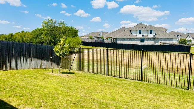 View of yard with a residential view | Image 36