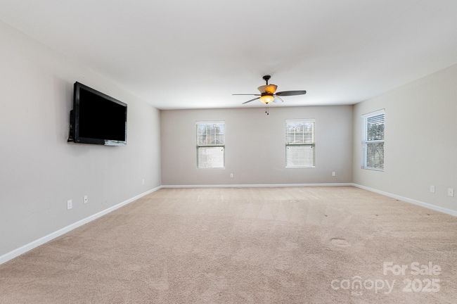 HUGE primary suite on upper level with ensuite bathroom and walk in closet. | Image 20