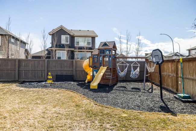 556 Boulder Creek Bay Se, Home with 3 bedrooms, 2 bathrooms and 4 parking in Langdon AB | Image 40