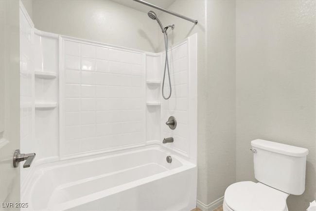 Full bathroom with toilet and shower / bathtub combination | Image 51