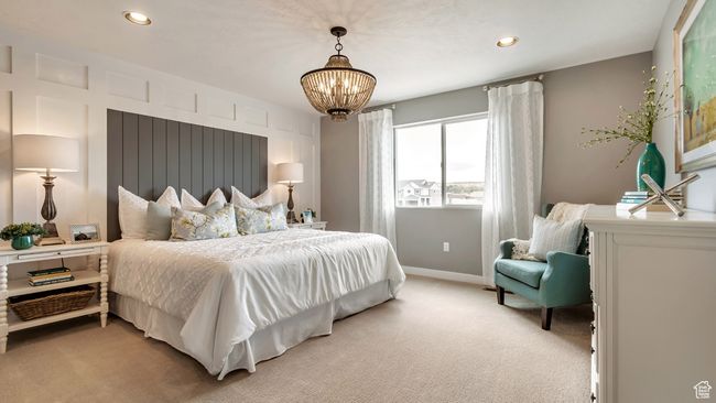Bedroom featuring baseboards, recessed lighting, a notable chandelier, and light colored carpet | Image 6
