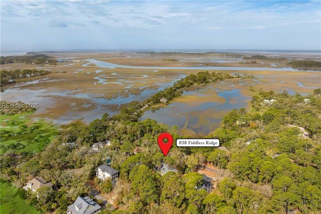 Hightide water view in front of home beyond the berm. | Image 57