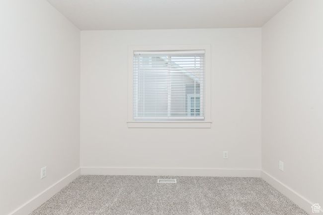 Carpeted empty room with baseboards | Image 19