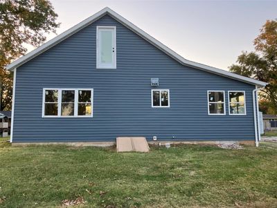 Property exterior at dusk with a yard | Image 2