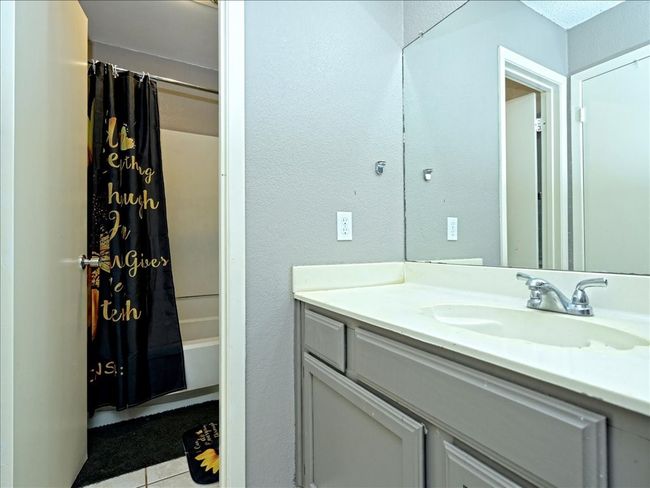 Not actual unit, similar layout. Bedroom 1 in suite full bath. | Image 11